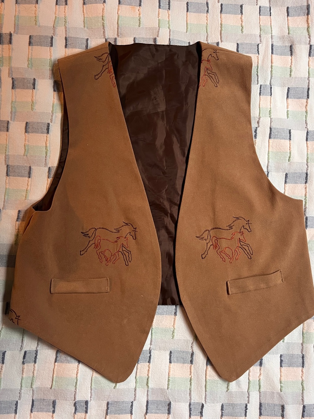 Gorgeous western vest with hand embroidered horses.